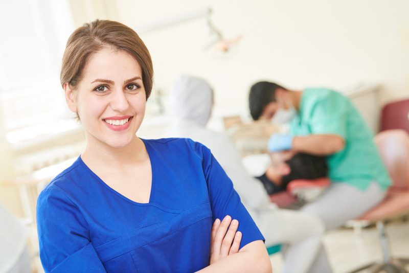 Dentist doctor portrait. young female asian woman at work in clinic